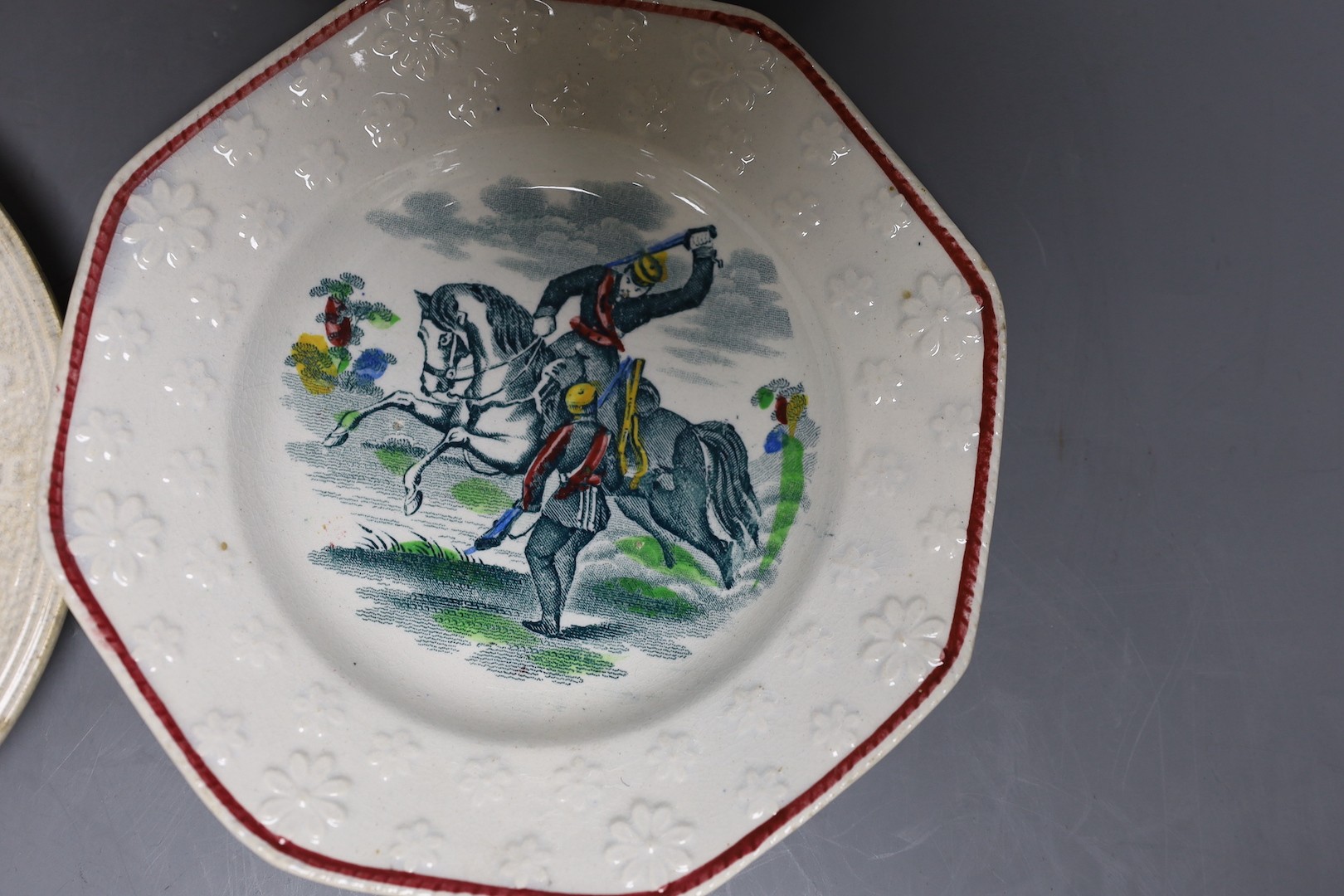 A group of mid-19th century Staffordshire rifle brigade and Crimean war commemorative nursery ceramics, Largest 21 cm